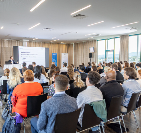 Image showing an audience from the back of a symposium hall