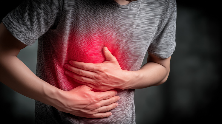 A symbolic image of a human corpse showing stomach ache